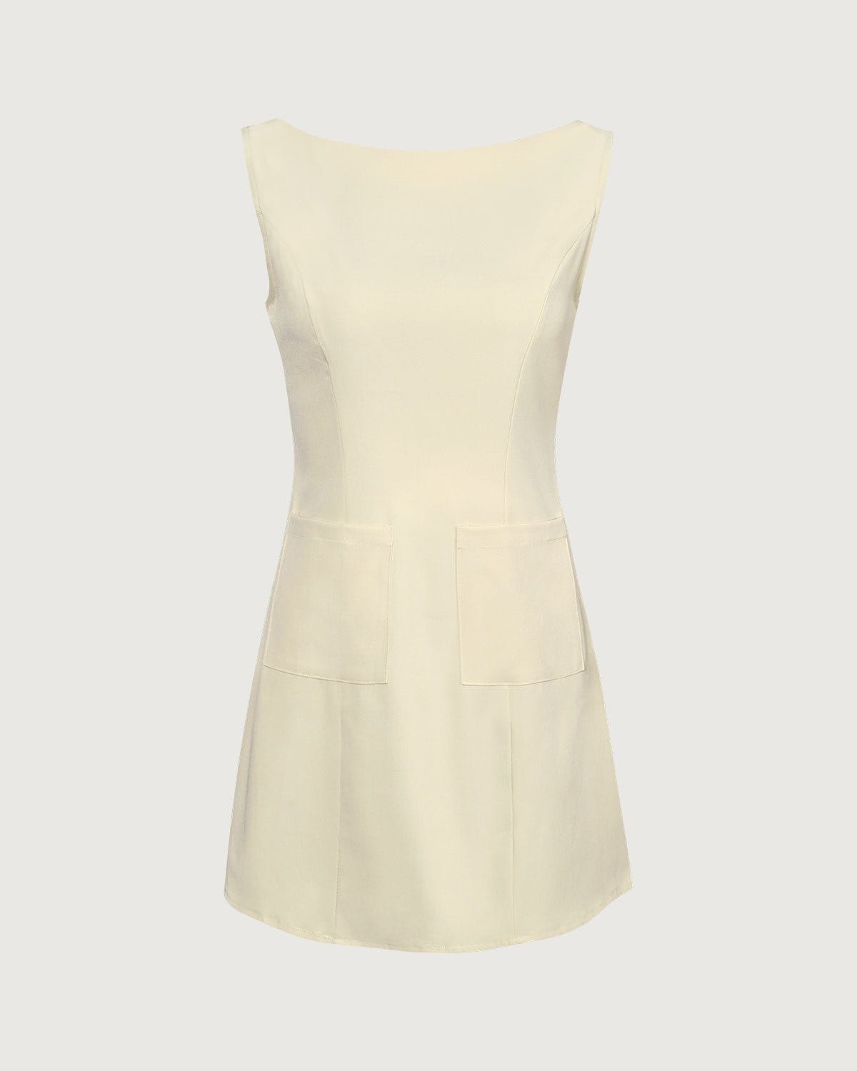 El vestido corto amarillo con escote tipo barco y recortes