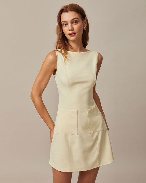 El vestido corto amarillo con escote tipo barco y recortes