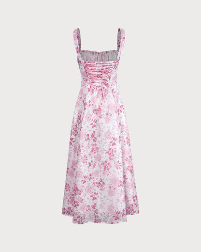 El vestido midi rosa con escote cuadrado, patrón floral y volantes