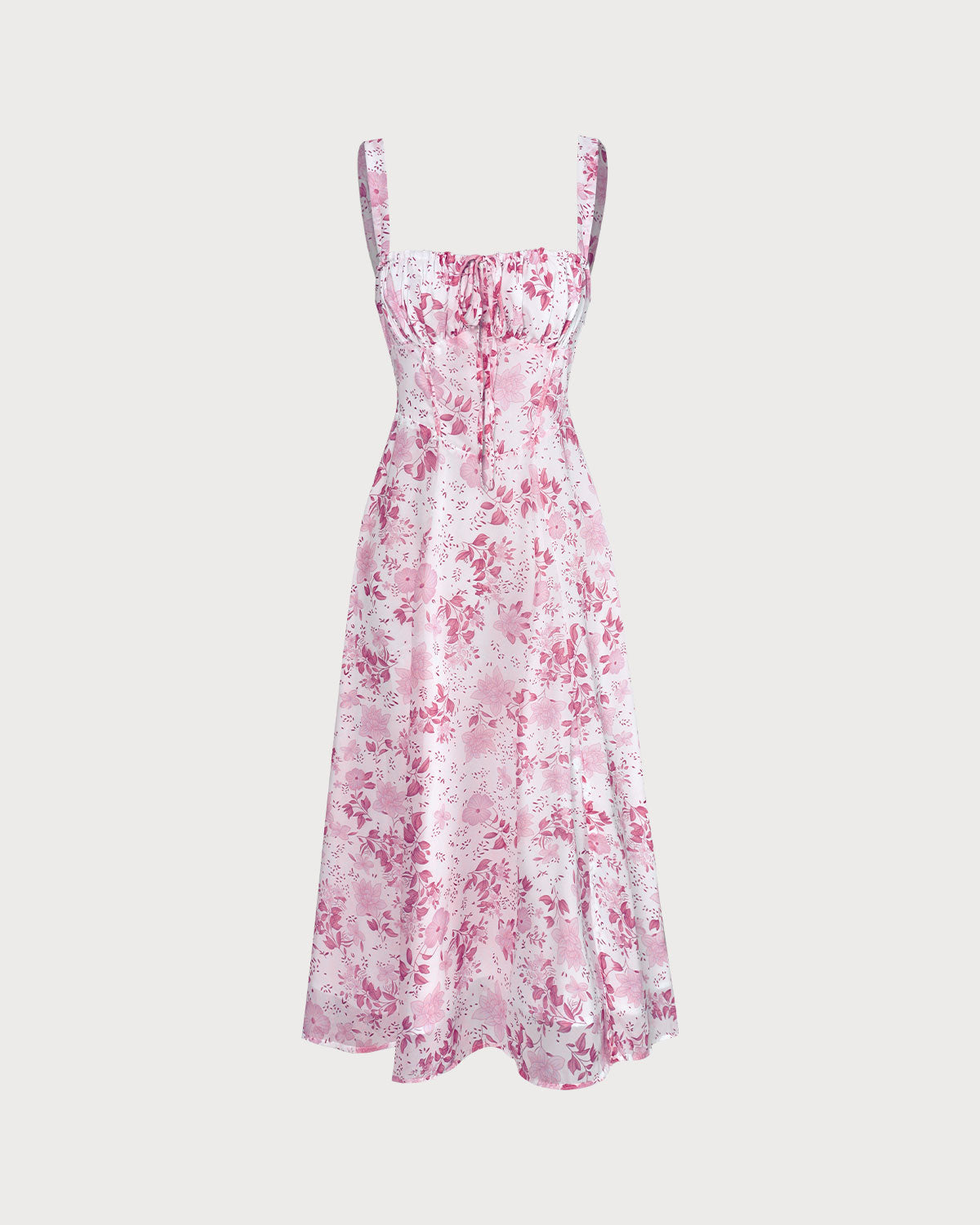 El vestido midi rosa con escote cuadrado, patrón floral y volantes