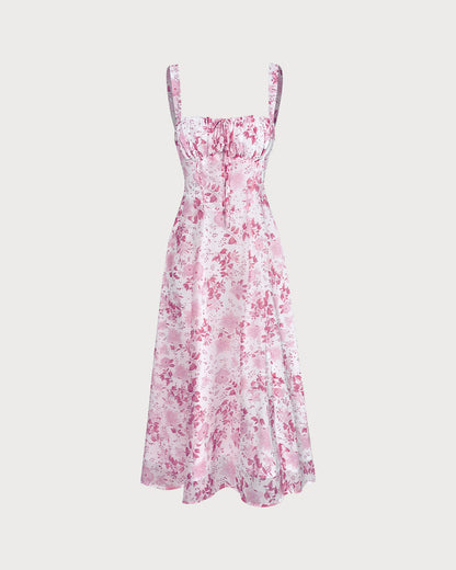 El vestido midi rosa con escote cuadrado, patrón floral y volantes