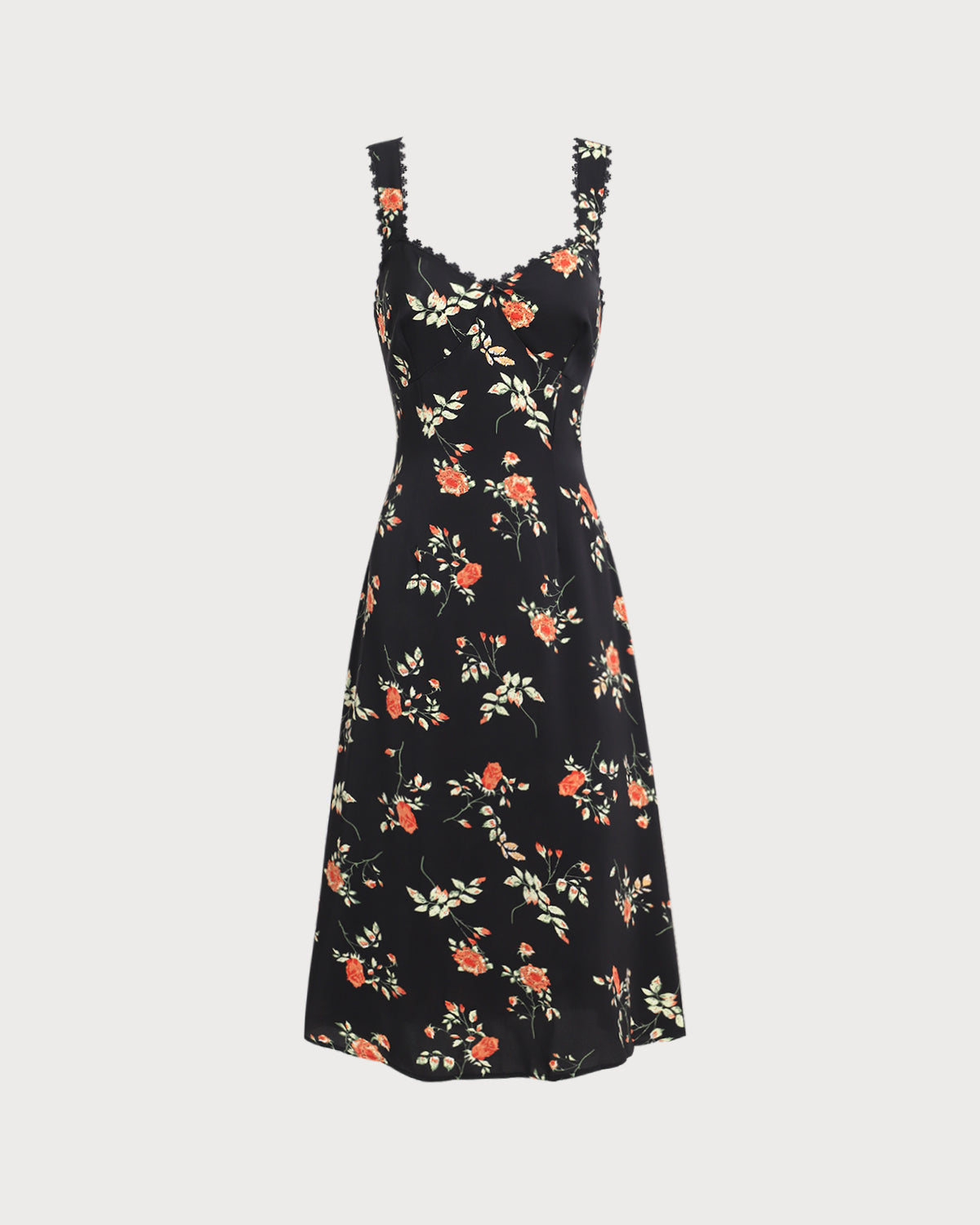 El vestido largo negro con flores, volantes y tirantes finos