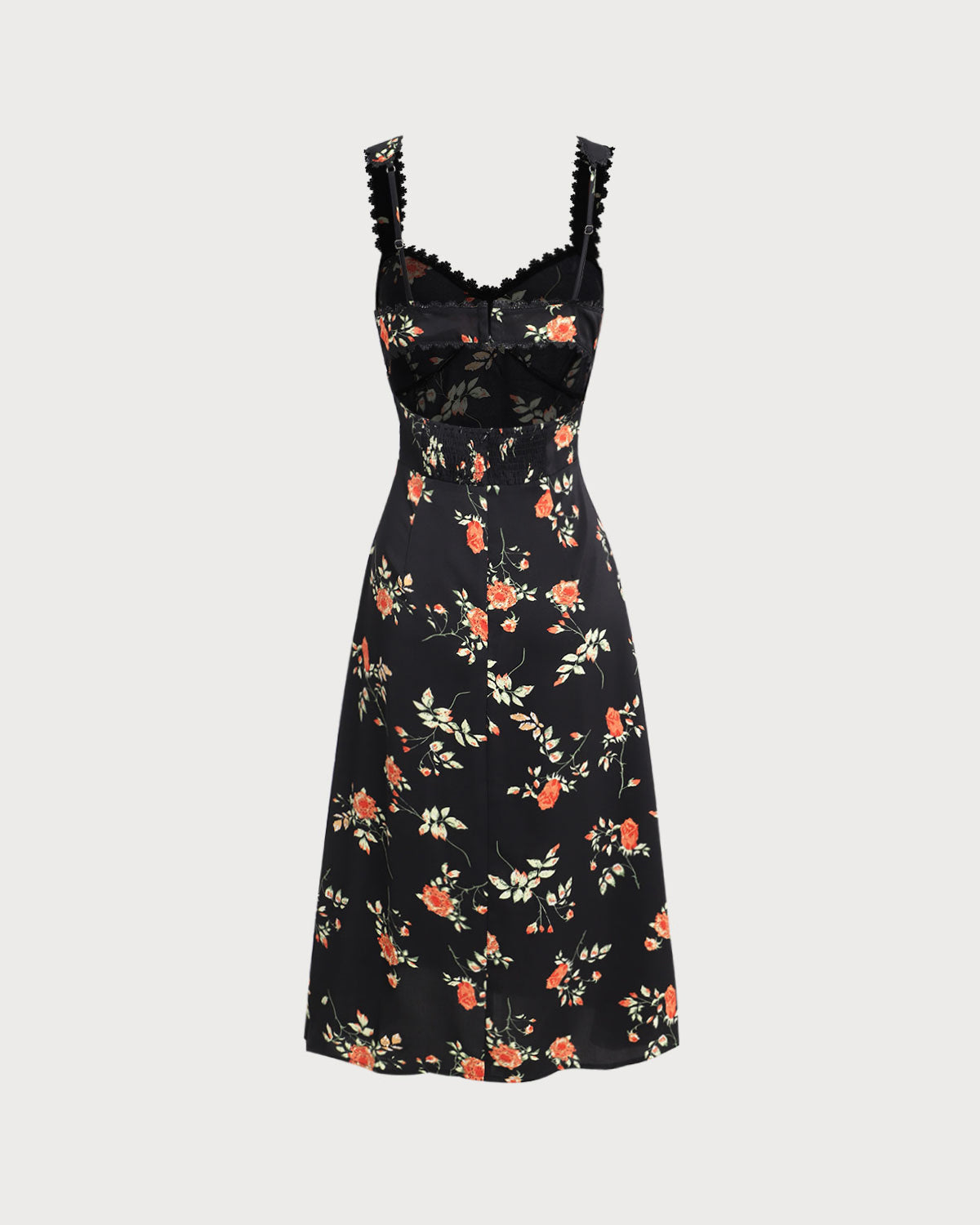 El vestido largo negro con flores, volantes y tirantes finos